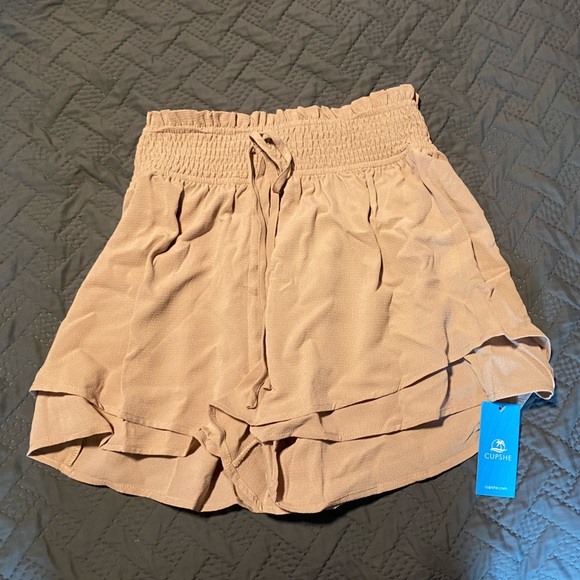 Women’s apricot smoked waist flared leg shorts. - Picture 1 of 1